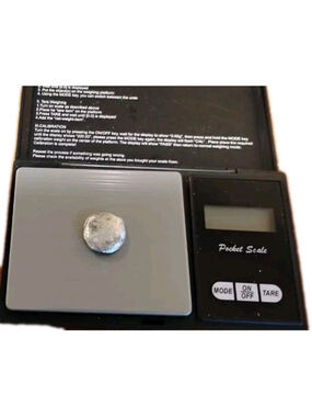 Scrap silver from melted Sterling Silver jewellery. Approx 8.3 grams.